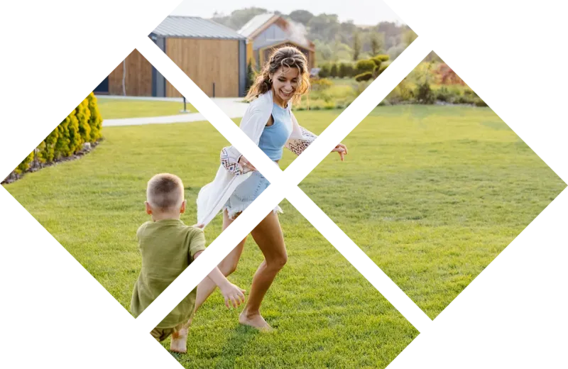 Mother and son running in green grass