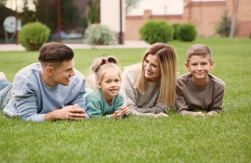 family enjoying back yard without mosquitoes