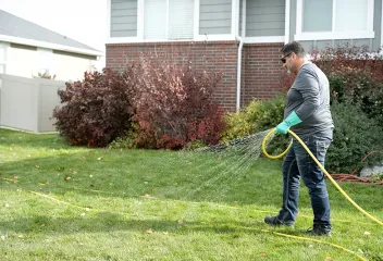 tech-spraying-lawn